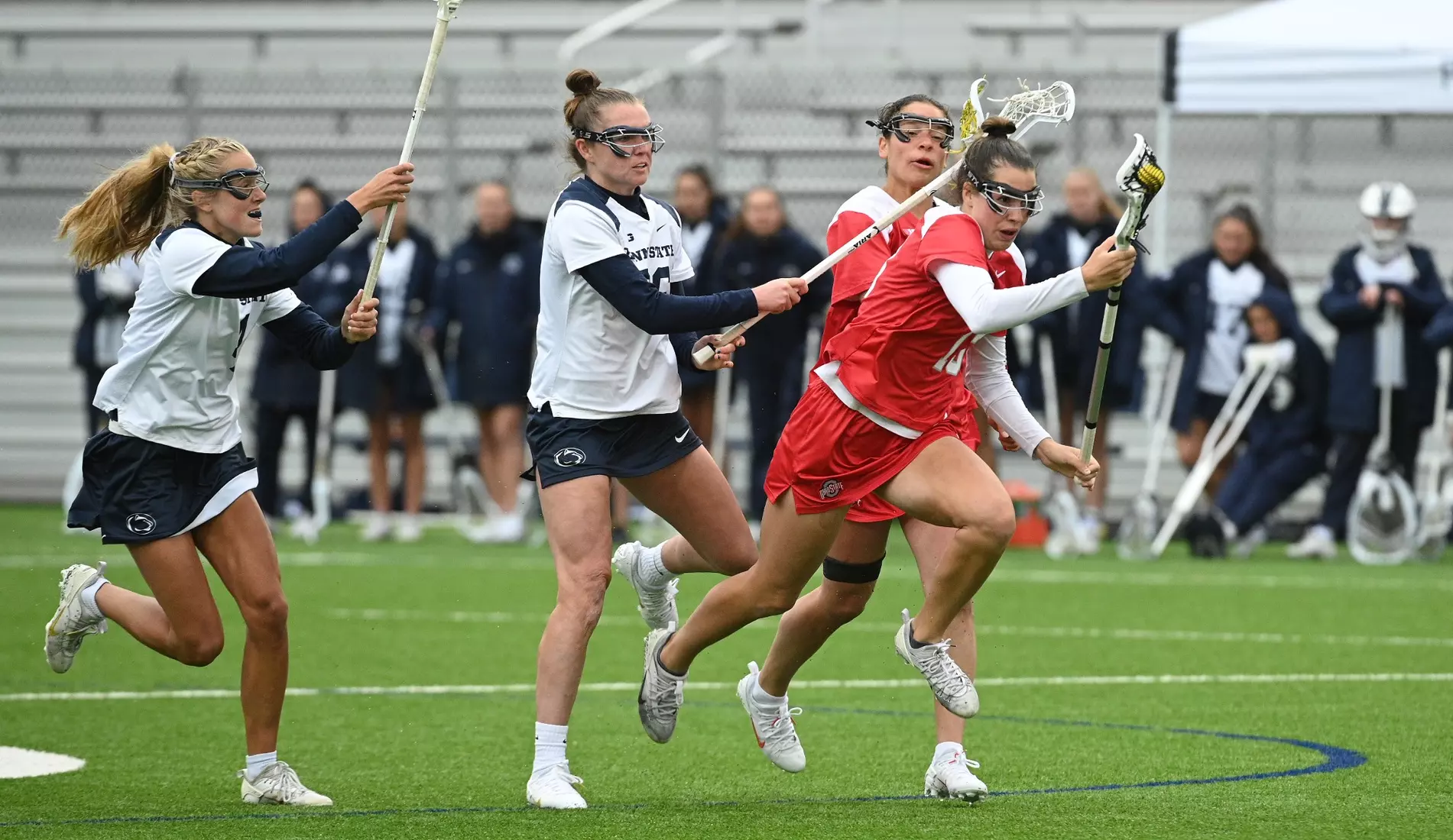 Ohio State's Kate Tyack (13) against Penn State during the 2024 Big Ten Women's Lacrosse Tournament quarterfinal game on April 27, 2024 in University Park, Pa. No. 7 seed Ohio State fell to No. 2 seed Penn State 13-15. Photo/Craig Houtz