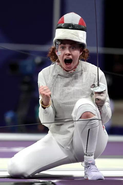 PARIS, FRANCE - JULY 28: Eleanor Harvey of Team Canada celebrates her victory over Julia Walczyk-Klimaszyk of Team Poland (not pictured) in the Fencing Women's Foil Individual Table of 16 on day two of the Olympic Games Paris 2024 at Grand Palais on July 28, 2024 in Paris, France. (Photo by Al Bello/Getty Images)