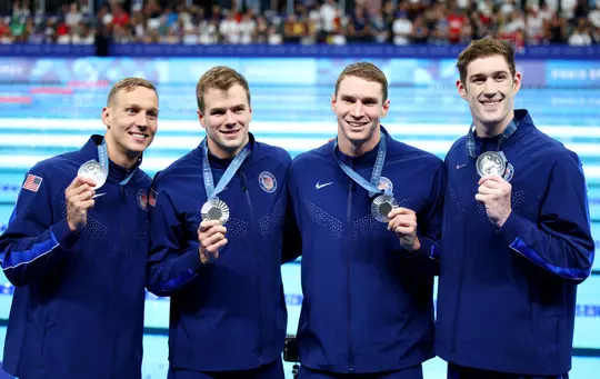 NANTERRE, FRANCE - AUGUST 04: Silver Medalists Ryan Murphy, Nic Fink, Caeleb Dressel and Hunter Armstrong of Team United States pose following the Swimming medal ceremony after the Men's 4x100m Medley Relay Final on day nine of the Olympic Games Paris 2024 at Paris La Defense Arena on August 04, 2024 in Nanterre, France. (Photo by Adam Pretty/Getty Images)