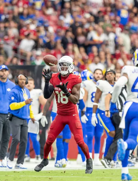 Marvin Harrison, Jr. (18) catches a pass against the Los Angeles Rams in an NFL football game, Sunday, Sept. 15, 2024, in Glendale, Ariz. (AP Photo/Jeff Lewis)
