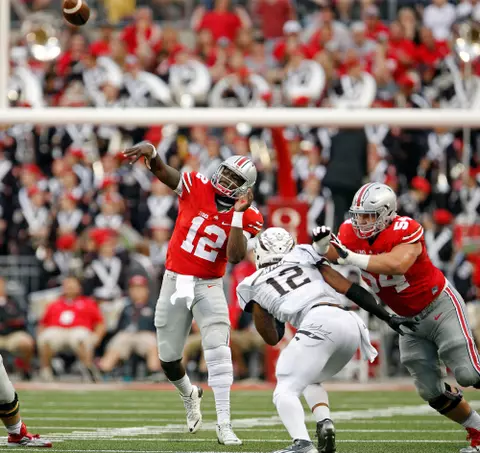 Ohio State Buckeyes quarterback Cardale Jones (12) throws a deep pass against Western Michigan Broncos defense in the 4th quarter of their game at Ohio Stadium on September 26, 2015.  (Dispatch photo by Kyle Robertson)