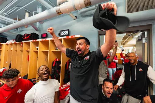 Ryan Day celebrating in locker room after win over Wisconsin