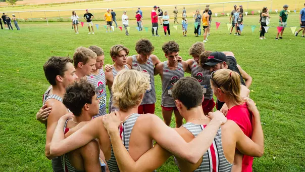 Men's XC huddle