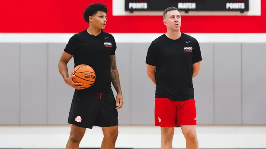 Coach Diebler & John Mobley Jr. Talking at Basketball Practice