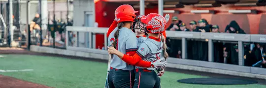 Softball Players Celebrating