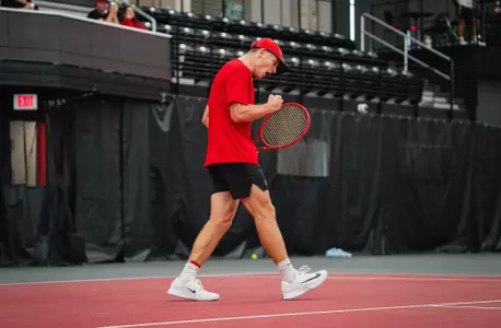 Preston Stearns celebrating winning round of 16 match at ITA Midwest Regional
