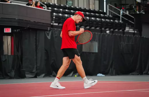Preston Stearns celebrating winning round of 16 match at ITA Midwest Regional