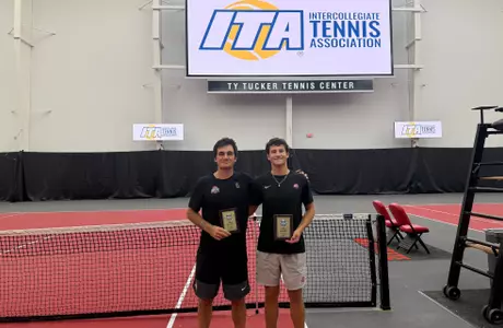 Victor Lilov (left) and Brandon Carpico (right) with their NCAA Qualifier plaques.