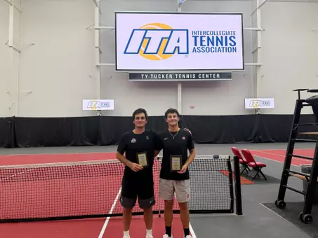Victor Lilov (left) and Brandon Carpico (right) with their NCAA Qualifier plaques.