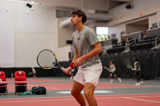 Ilija Palavestra ready for a volley at the net at the ITA Midwest Regionals