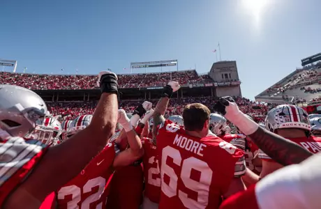 A group of offensive lineman prior to the start of the game against Illinois.