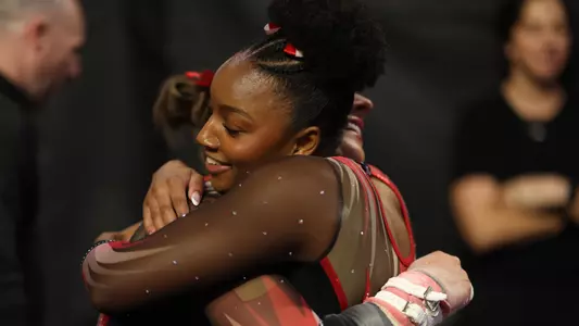 WGYM Cameron Smith and Tory Vetter hug after NCAA Championships competition
