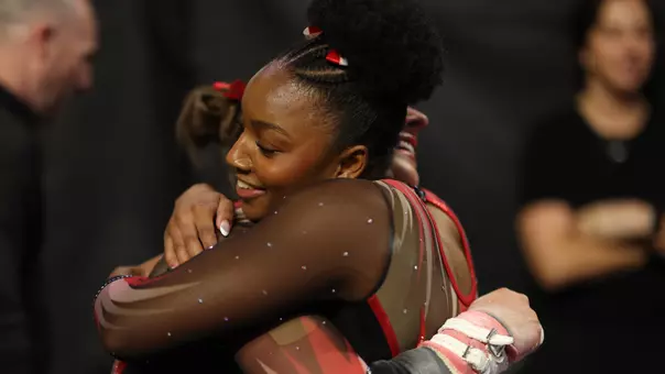 WGYM Cameron Smith and Tory Vetter hug after NCAA Championships competition