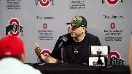 Football Players and Coaches Talk With Media After Practice