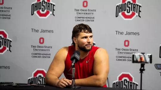 Football Players and Coaches Talk With Media After Practice