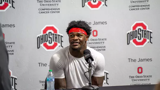 TJ Alford at the mic for media