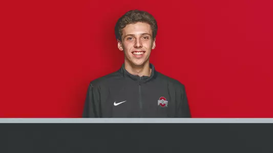 Head shot graphic of Andrew Lutschaunig announcing his hiring as the new assistant coach for men's tennis.