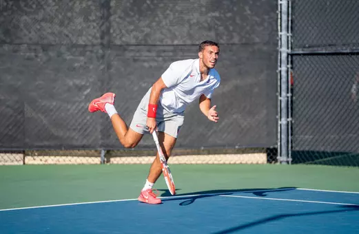 JJ Tracy serving in NCAA Doubles Championship in 2024