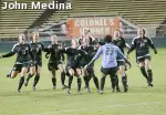 OSU celebrates its penalty kick shootout win over USC in the opening round of the NCAA Soccer Championship Friday.