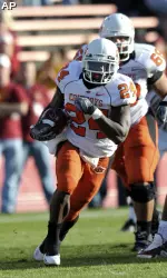Kendall Hunter carries the ball in the first half.