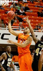 Marshall Moses scores two of his career-high 23 points against UAPB.