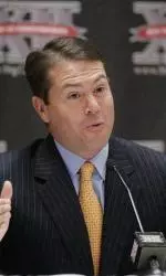 Travis Ford's contract now runs through 2019.