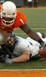 Dez Bryant leans over the goal line.