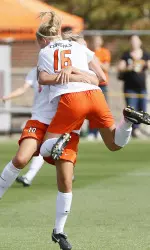 Taylor Mathews and Megan Marchesano celebrate after a second-half goal in Saturday's win over Nebraska.