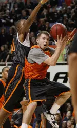 Keiton Page drives for a basket during the Cowboys' scrimmage at Homecoming & Hoops.