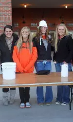 OSU student athletes helped raise money and canned foods for the Harvest II Food Bank.