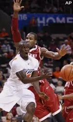 Ray Penn dishes out one of his game-high seven assists against Alabama in the All-College Classic.