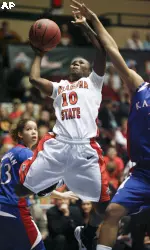 Andrea Riley scored 43 points to set the Big 12 tournament single-game record for the second straight game.