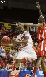Andrea Riley looks to pass the ball off in the first half.