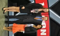 Head Coach Kurt Budke with sophomores Vicky McIntyre and Tiffany Bias