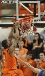 Le'Bryan Nash dunks for two of his game-high 26 points against Panhandle State.