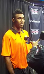 Le'Bryan Nash speaks to a reporter who covers the newest member of the league, West Virginia.