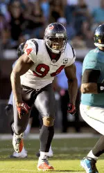 Antonio Smith bagged two QB sacks in Houston's 43-13 win over Baltimore.