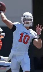 File: Clint Chelf threw for 292 yards and four touchdowns in his first career start.
