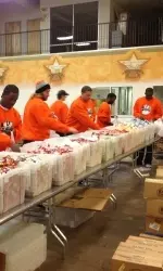 A group of Cowboys volunteered at the North Texas Food Bank Saturday.