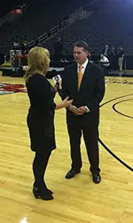 Travis Ford interviews with ESPNU's Holly Rowe during Big 12 Media Day.