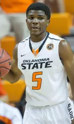 Stevie Clark scored 10 points off the bench in his first unofficial game as a Cowboy on Sunday afternoon.