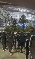 The Cowboys enter AT&T Stadium.