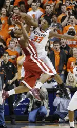Marcus Smart blocks an Oklahoma three-point shot attempt with 18 seconds to go in the second half.
