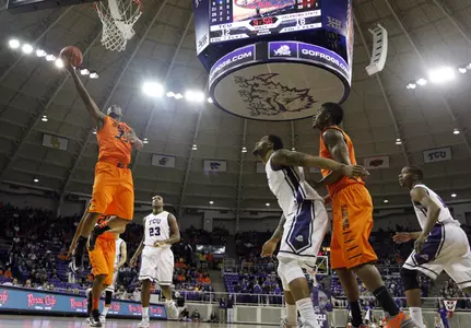 Oklahoma State guard Marcus Smart (33) goes up for a basket after getting by TCU 's Devonta Abron (23) in the first half of an NCAA basketball game on Wednesday, Feb. 27, 2013, in Fort Worth, Texas. (AP Photo/Tony Gutierrez)
