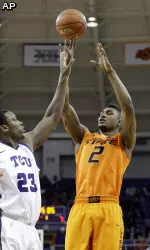 Le'Bryan Nash hits a shot in the first half.