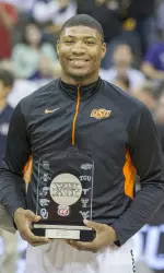 Marcus Smart received the Big 12 Player of the Year trophy at the Sprint Center in Kansas City during the Phillips 66 Big 12 Championship.