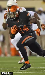 Tyreek Hill rushes up field against the Texas Longhorns during the second half.