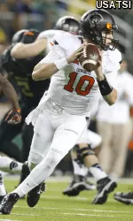 Mason Rudolph (10) rolls out to pass in the second quarter.