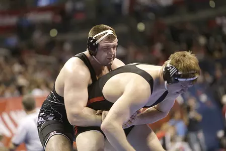 Oklahoma State's Austin Marsden wrestles Collin Jensen of Nebraska in the 285-pound championship bracket during the first round of the NCAA Wrestling Championships in Oklahoma City, March 20, 2014.