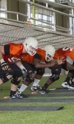 The Cowboy offensive line running drills.
